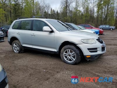 Czwarte zdjęcie samochodu z boku: 2010 VOLKSWAGEN TOUAREG TDI VIN:WVGFK6A96AD002782 - miniatura
