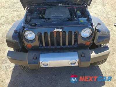 Zdjęcie 11 z 13 samochodu: 2012 JEEP WRANGLER UNLIMITED SAHARA VIN:1C4HJWEG2CL134598 - miniatura