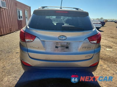 Zdjęcie 6 z 12 samochodu: 2012 HYUNDAI TUCSON GLS VIN:KM8JUCAC2CU529462 - miniatura