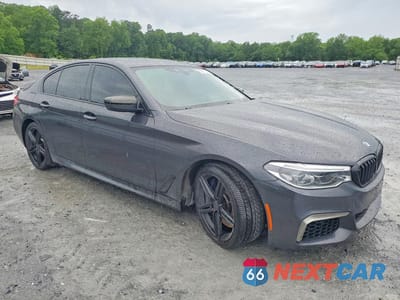 Czwarte zdjęcie samochodu z boku: 2018 BMW M550XI VIN:WBAJB9C51JB286017 - miniatura