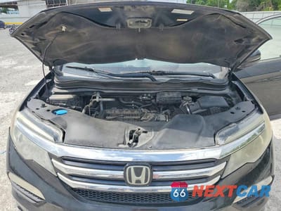 Zdjęcie 11 z 12 samochodu: 2016 HONDA PILOT TOURING VIN:5FNYF6H99GB115148 - miniatura