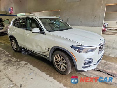 Czwarte zdjęcie samochodu z boku: 2021 BMW X5 XDRIVE40I VIN:5UXCR6C02M9H00297 - miniatura