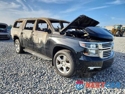 Czwarte zdjęcie samochodu z boku: 2017 CHEVROLET SUBURBAN K1500 PREMIER VIN:1GNSKJKC4HR389403 - miniatura