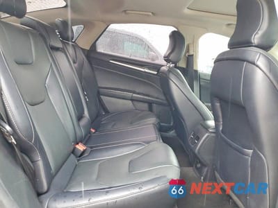 Zdjęcie 10 z 12 samochodu: 2018 FORD FUSION TITANIUM VIN:3FA6P0D92JR234016 - miniatura