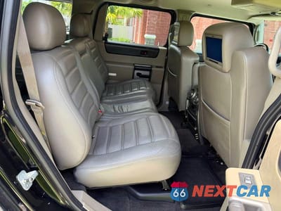 Zdjęcie 6 z 13 samochodu: 2003 HUMMER H2 VIN:5GRGN23U03H119486 - miniatura