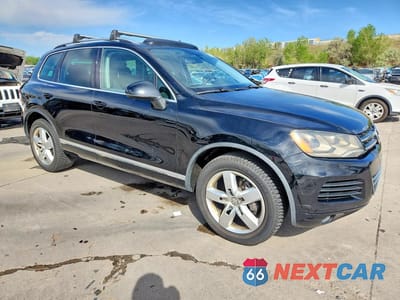 Czwarte zdjęcie samochodu z boku: 2012 VOLKSWAGEN TOUAREG V6 TDI VIN:WVGEK9BP3CD005992 - miniatura