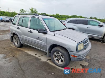 Czwarte zdjęcie samochodu z boku: 2002 CHEVROLET TRACKER ZR2 VIN:2CNBJ734126931755 - miniatura
