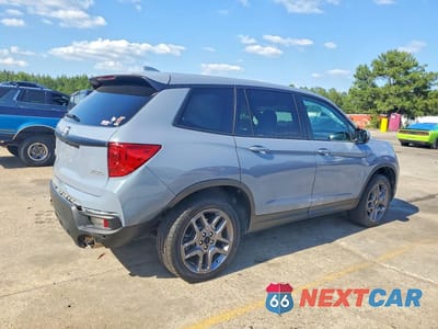 Trzecie zdjęcie samochodu z tyłu: 2023 HONDA PASSPORT EXL VIN:5FNYF8H5XPB029680 - miniatura