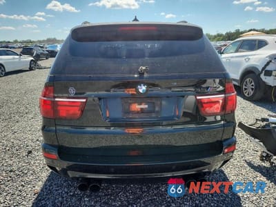 Zdjęcie 6 z 12 samochodu: 2011 BMW X5 M VIN:5YMGY0C56BLK26311 - miniatura