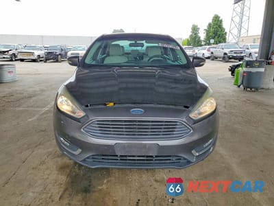 Piąte zdjęcie samochodu w środku: 2017 FORD FOCUS TITANIUM VIN:1FADP3J20HL288147 - miniatura