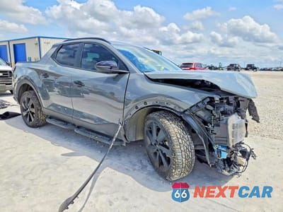 Czwarte zdjęcie samochodu z boku: 2024 HYUNDAI SANTA CRUZ NIGHT VIN:5NTJCDDFXRH104692 - miniatura