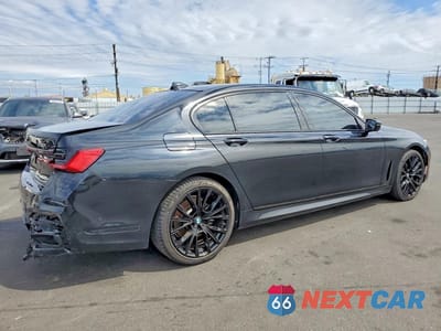 Trzecie zdjęcie samochodu z tyłu: 2022 BMW 740 I VIN:WBA7T2C07NCJ53362 - miniatura