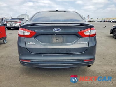 Zdjęcie 6 z 13 samochodu: 2013 FORD FUSION TITANIUM PHEV VIN:3FA6P0SU8DR365799 - miniatura