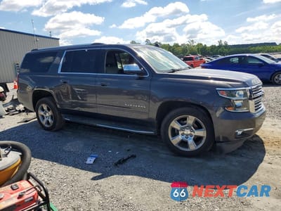 Czwarte zdjęcie samochodu z boku: 2018 CHEVROLET SUBURBAN C1500 PREMIER VIN:1GNSCJKC7JR199694 - miniatura