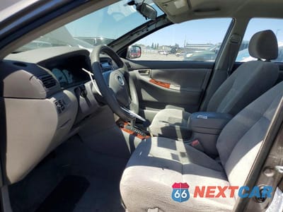 Zdjęcie 7 z 13 samochodu: 2004 TOYOTA COROLLA LE VIN:1NXBR32E94Z205285 - miniatura