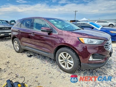 Czwarte zdjęcie samochodu z boku: 2019 FORD EDGE SEL VIN:2FMPK4J94KBB38876 - miniatura
