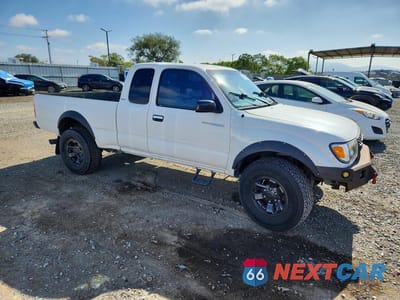 Czwarte zdjęcie samochodu z boku: 1999 TOYOTA TACOMA XTRACAB PRERUNNER VIN:4TASN92N6XZ416126 - miniatura