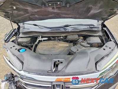 Zdjęcie 12 z 13 samochodu: 2018 HONDA PILOT VIN:5FNYF6H5XJB021008 - miniatura
