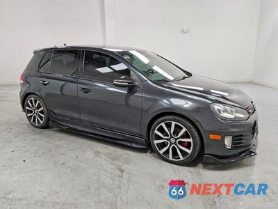 Czwarte zdjęcie samochodu z boku: 2012 VOLKSWAGEN GTI VIN:WVWHV7AJ2CW090631 - miniatura