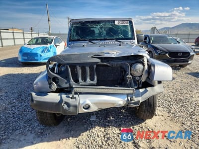 Piąte zdjęcie samochodu w środku: 2015 JEEP WRANGLER SAHARA VIN:1C4AJWBG5FL703034 - miniatura