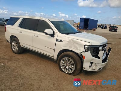 Czwarte zdjęcie samochodu z boku: 2022 GMC YUKON SLT VIN:1GKS1BKT7NR112715 - miniatura