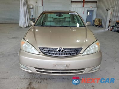 Piąte zdjęcie samochodu w środku: 2003 TOYOTA CAMRY XLE V6 VIN:JTDBF30K730151318 - miniatura