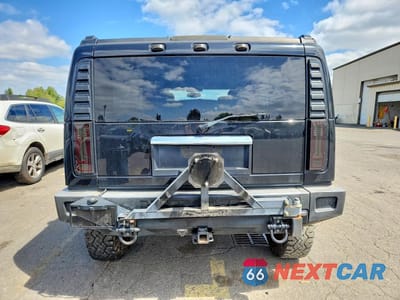 Zdjęcie 6 z 12 samochodu: 2005 HUMMER H2 VIN:5GRGN23U65H110648 - miniatura