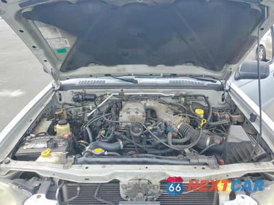 Zdjęcie 11 z 12 samochodu: 2002 NISSAN FRONTIER CREW CAB SC VIN:1N6MD29Y52C384494 - miniatura