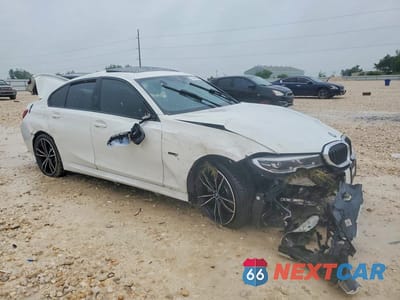 Czwarte zdjęcie samochodu z boku: 2022 BMW 330E VIN:3MW5P7J01N8C62743 - miniatura
