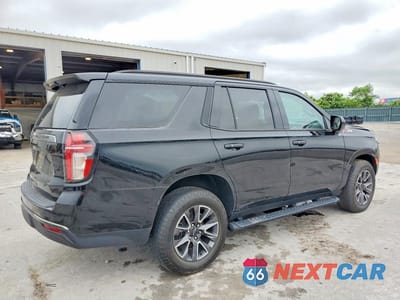 Trzecie zdjęcie samochodu z tyłu: 2021 CHEVROLET TAHOE K1500 Z71 VIN:1GNSKPKD9MR442148 - miniatura