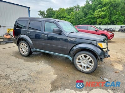 Czwarte zdjęcie samochodu z boku: 2011 DODGE NITRO HEAT VIN:1D4PT4GK4BW602374 - miniatura