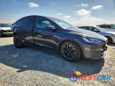 Czwarte zdjęcie samochodu z boku: 2023 TESLA MODEL X VIN:7SAXCAE58PF424945 - miniatura