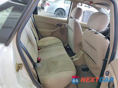 Zdjęcie 10 z 13 samochodu: 2004 FORD FOCUS SE COMFORT VIN:1FAHP34364W178105 - miniatura
