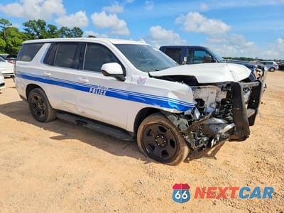 Czwarte zdjęcie samochodu z boku: 2022 CHEVROLET TAHOE C1500 VIN:1GNSCLED3NR239453 - miniatura