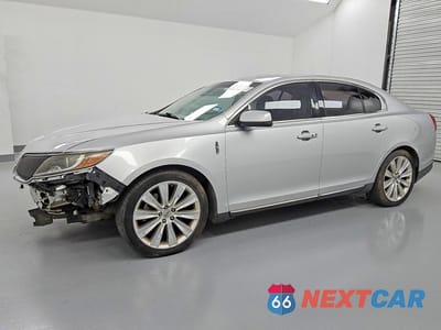 2015 LINCOLN MKS 1LNHL9FT1FG607990 - główne zdjęcie licytacji z USA - miniatura