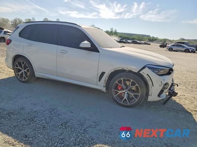 Czwarte zdjęcie samochodu z boku: 2022 BMW X5 SDRIVE 40I VIN:5UXCR4C06N9J35300 - miniatura