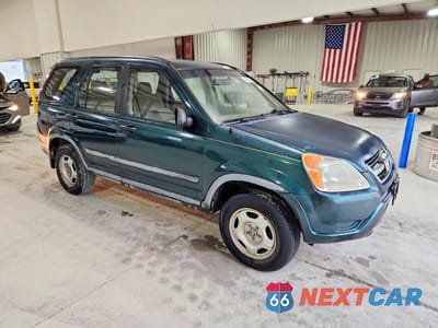 Czwarte zdjęcie samochodu z boku: 2003 HONDA CR-V LX VIN:JHLRD68463C011368 - miniatura