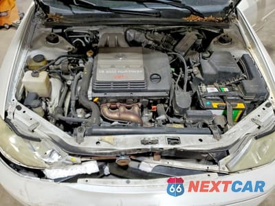 Zdjęcie 11 z 12 samochodu: 2002 TOYOTA AVALON XLS VIN:4T1BF28B92U202920 - miniatura