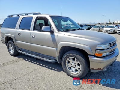 Czwarte zdjęcie samochodu z boku: 2003 CHEVROLET SUBURBAN K1500 VIN:3GNFK16Z43G163130 - miniatura