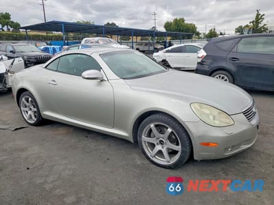 Czwarte zdjęcie samochodu z boku: 2002 LEXUS SC 430 VIN:JTHFN48Y120029795 - miniatura