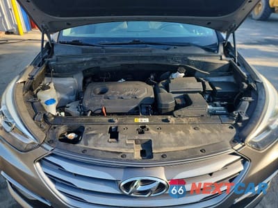 Zdjęcie 12 z 13 samochodu: 2018 HYUNDAI SANTA FE SPORT 2.4L VIN:5NMZUDLB6JH066005 - miniatura