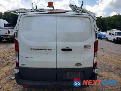 Zdjęcie 6 z 12 samochodu: 2015 FORD TRANSIT T-150 VIN:1FTNE1ZM6FKA44696 - miniatura