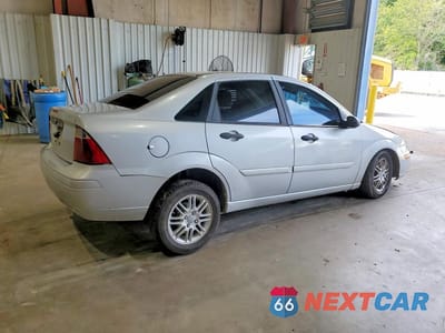 Trzecie zdjęcie samochodu z tyłu: 2007 FORD FOCUS ZX4 VIN:1FAFP34N97W206900 - miniatura