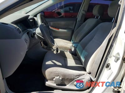 Zdjęcie 7 z 12 samochodu: 2003 TOYOTA COROLLA LE VIN:JTDBR32E430020359 - miniatura