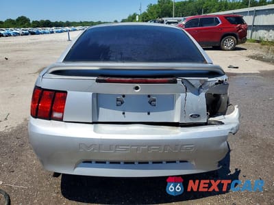Zdjęcie 6 z 13 samochodu: 2000 FORD MUSTANG VIN:1FAFP4049YF141146 - miniatura