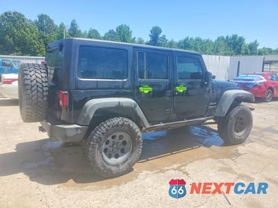 Trzecie zdjęcie samochodu z tyłu: 2012 JEEP WRANGLER UNLIMITED SPORT VIN:1C4BJWDG6CL119190 - miniatura