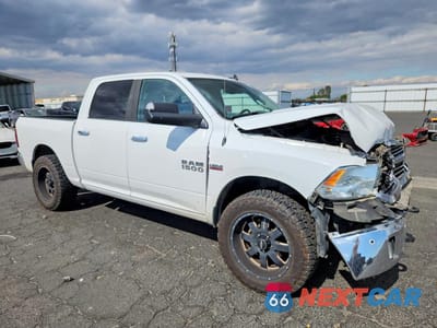 Czwarte zdjęcie samochodu z boku: 2016 RAM 1500 SLT VIN:3C6RR7LT8GG262311 - miniatura