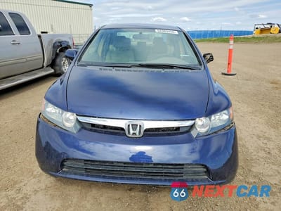 Piąte zdjęcie samochodu w środku: 2006 HONDA CIVIC LX VIN:1HGFA15426L807685 - miniatura