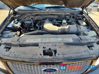 Zdjęcie 11 z 12 samochodu: 2000 FORD F150 VIN:1FTRX08L6YKB35548 - miniatura