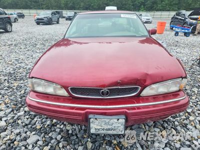 Piąte zdjęcie samochodu w środku: 1994 PONTIAC BONNEVILLE SE VIN:1G2HX52L3R4242942 - miniatura